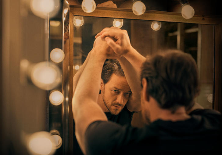 James McAvoy reflected in a mirror