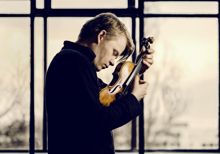 Pekka lost in the moment as he passionately plays his violin