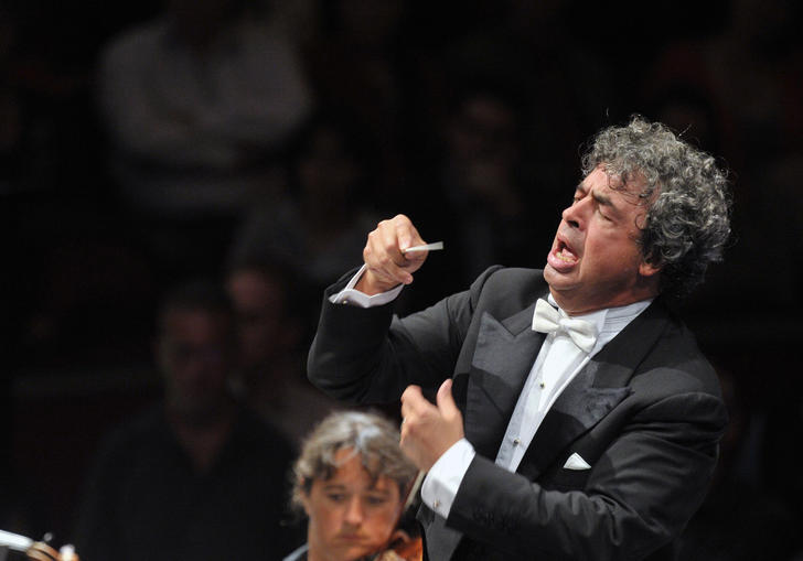 Seymon conducting with great passion and vigor 