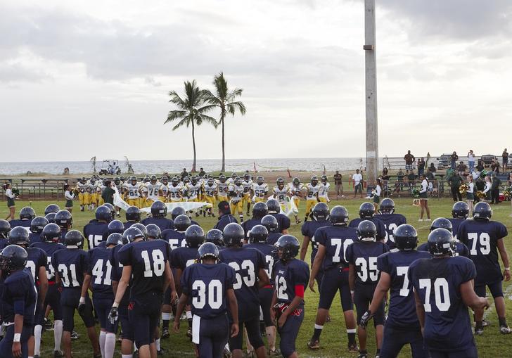 American Football players on the field, from Catherine Opie's photographic series High School Football
