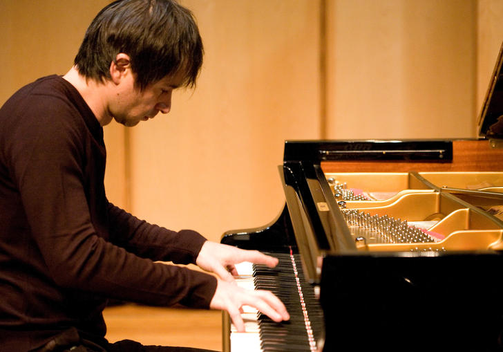 Piotr playing the piano
