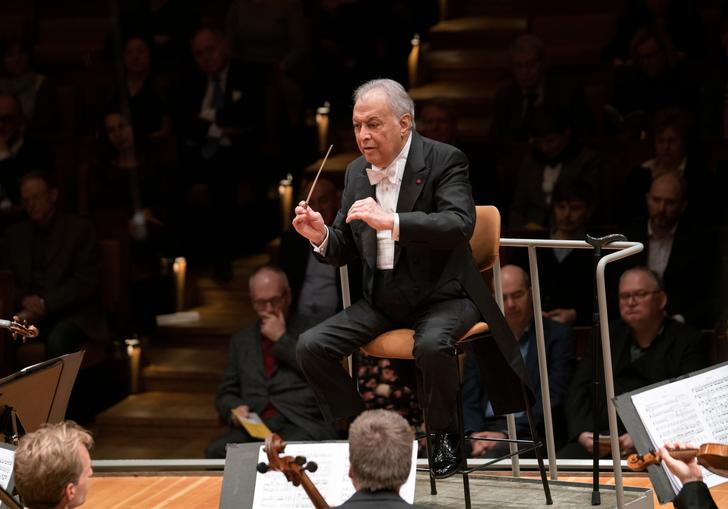 Zubin Mehta conducting the Berlin Philharmonic from a chair