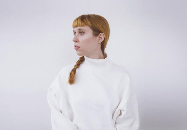photo of holly herndon dressed in white