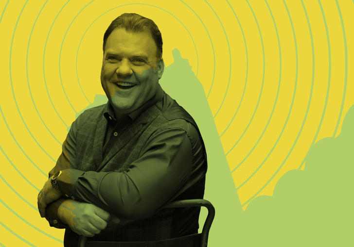 Bryn Terfel laughing in front of the Barbican tower