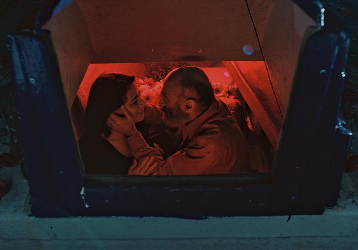 A man and a woman embrace in a still from Gaza Mon Amour