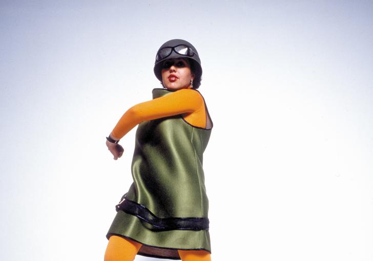 poly styrene dancing in front of a white background