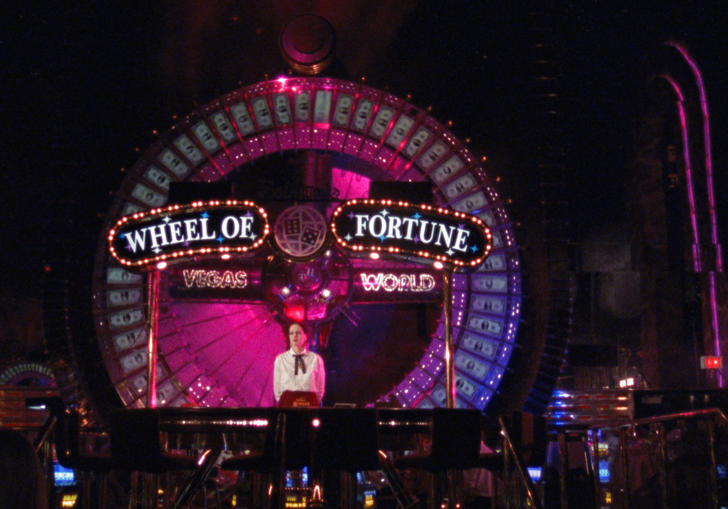 Las Vegas Wheel of Fortune lit up in neon lights