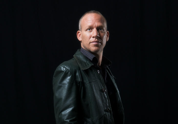 photo of Avishai Cohen against a dark background