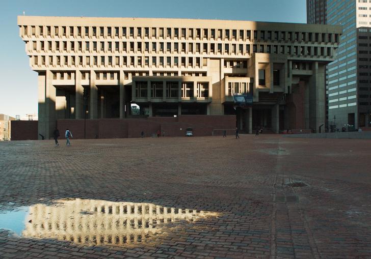 City Hall with a puddle in front of it