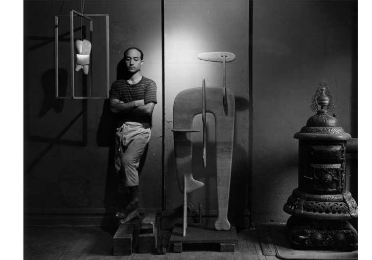 Isamu Noguchi in his studio