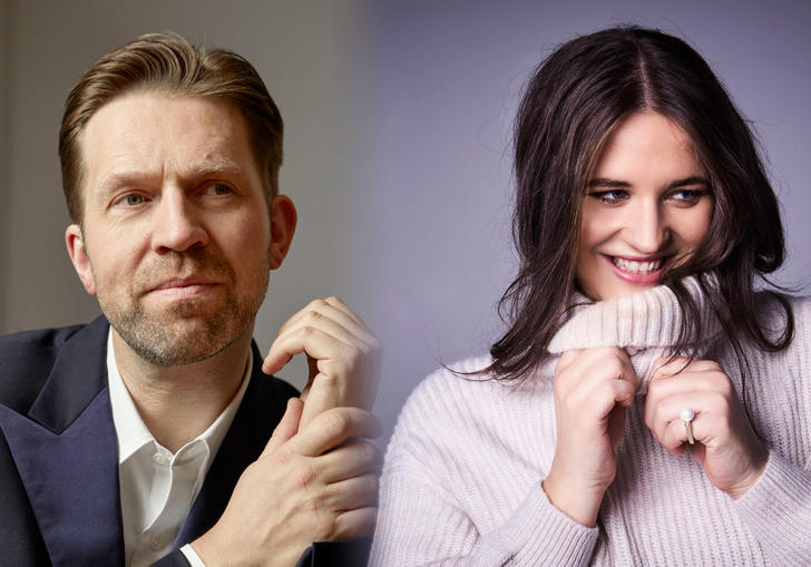 In the left of the image Leif Ove Andsnes is looking to his right slighty, holding his left hand with his right. In the right of the image Lise Davidsen is smiling and looking to her left, holding the neckline of her jumper.