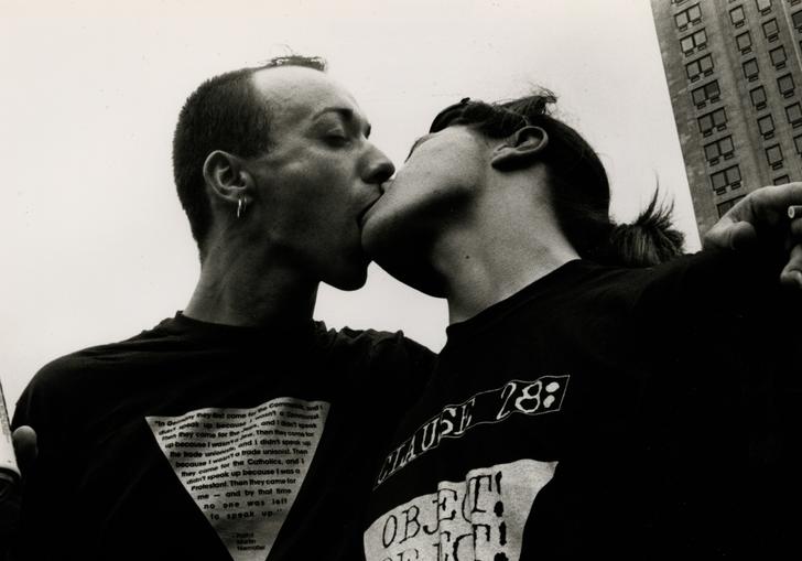 People kissing at LGBTQ+ protest