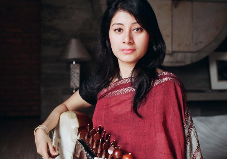 Rajrupa Chowdhury seated with her sarod