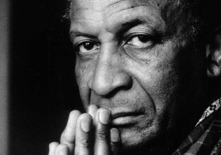 a close up black and white photo of Abdullah Ibrahim