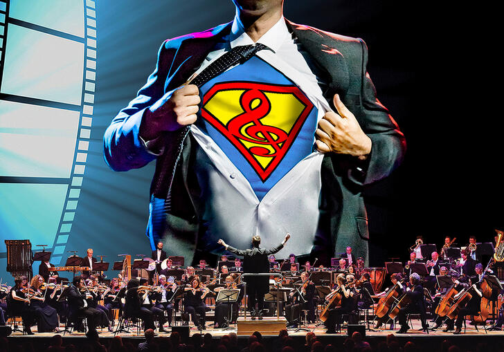 The London Concert Orchestra playing in front of a Superman themed backdrop