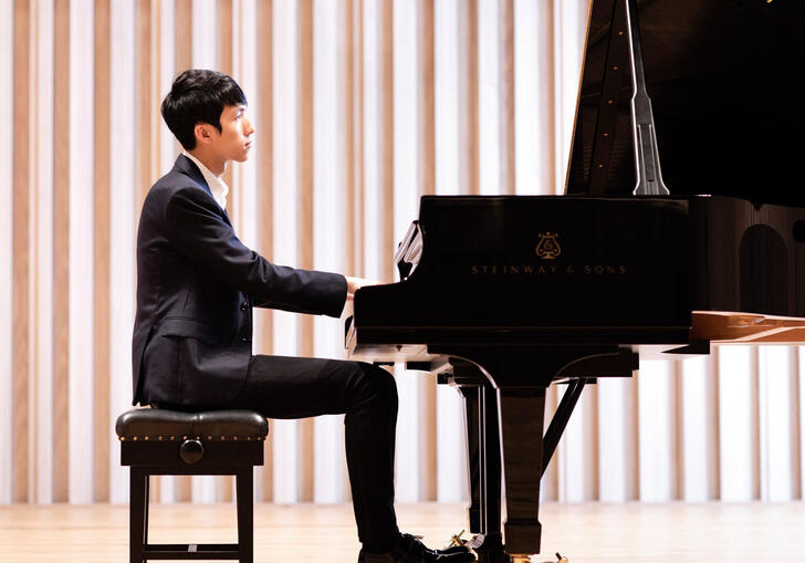 Eric Lu playing the piano