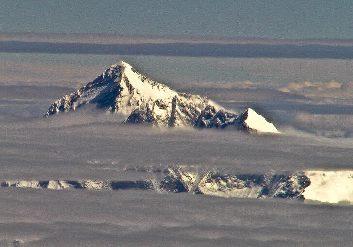 The peak of Mount Everest above the clouds