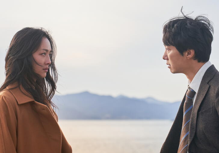 A man and woman stand together