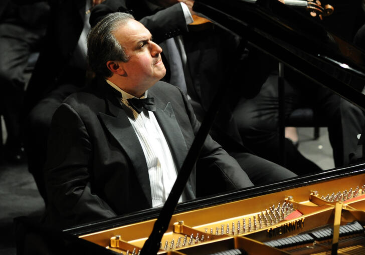 Pianist Yefim Bronfman performing on stage