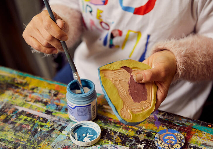 a colour photo of a person making art