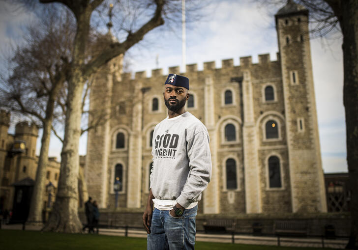 Inua Ellams standing outside the Tower of London