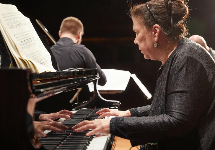 Close up on pianist of chamber ensemble