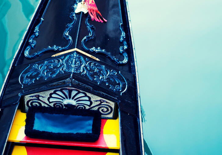 Close up photo of a gondola on the water