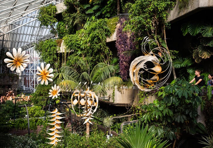 sculptures hang from the ceiling of the Conservatory