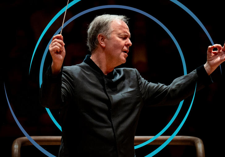 Sakari Oramo conducting, with blue circular swirls framing him