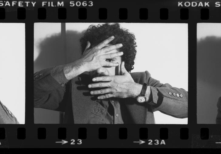 A film negative showing the artist Nickzad Nodjoumi