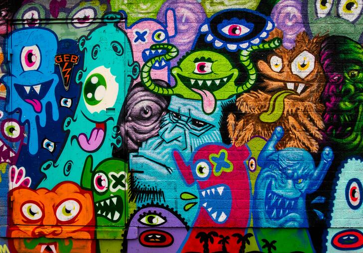 Colourful graffiti art with cartoon faces