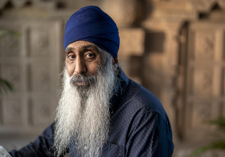 Davinder Panesar turning to look at the camera