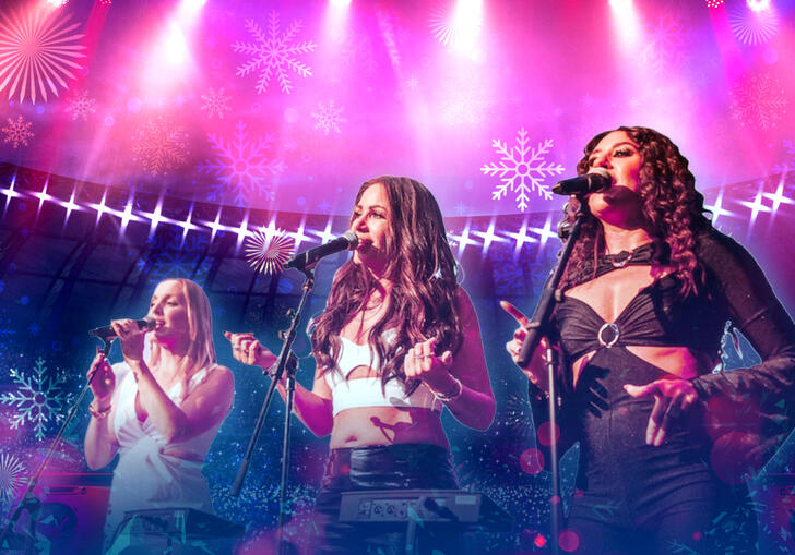Three female singers with a pink background