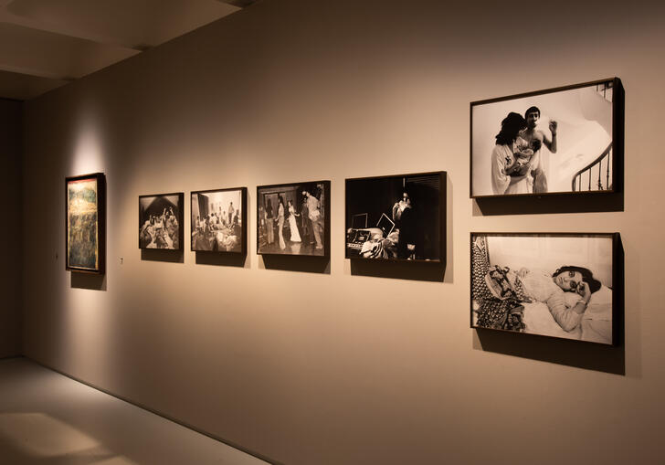 A photo of some of Pablo Bartholomew's photographs on the wall in the Barbican Art Gallery