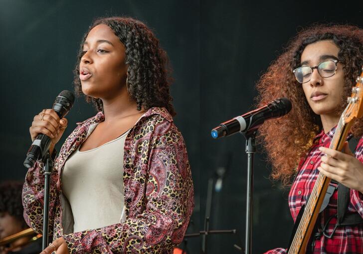 Music Education Islington performance - young singer and guitar player