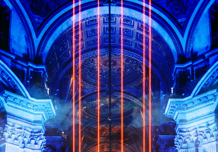 A large building adorned with vibrant neon lights