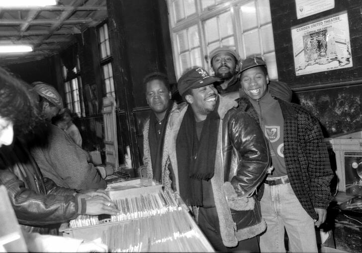 Standing in a record shop