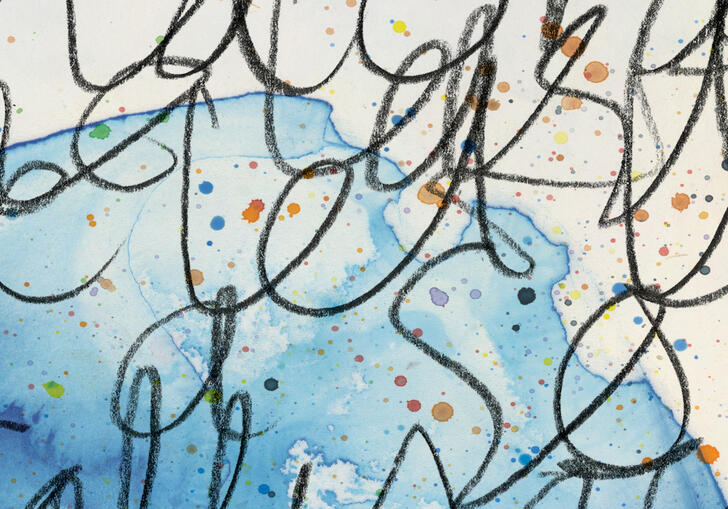 Abstract script over blue ink stained paper
