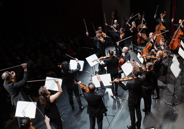 Top angle shot of the orchestra mid performance