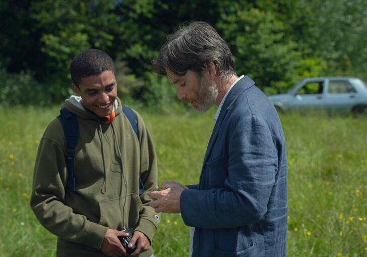 Two men talking