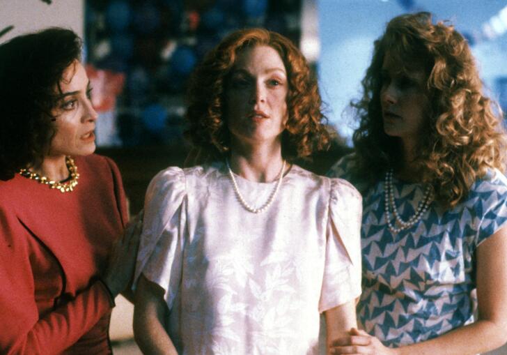 Three women standing together