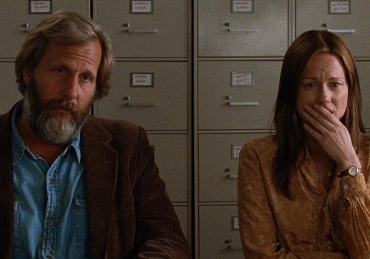 A man and a woman sitting