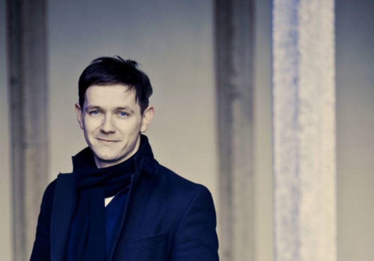A full colour photograph of Iestyn Davies
