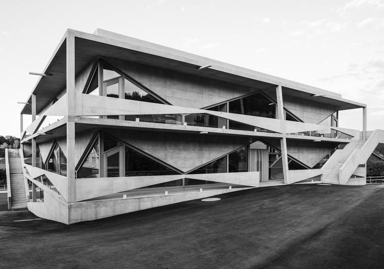 Photo of building in black and white by Angela Deuber