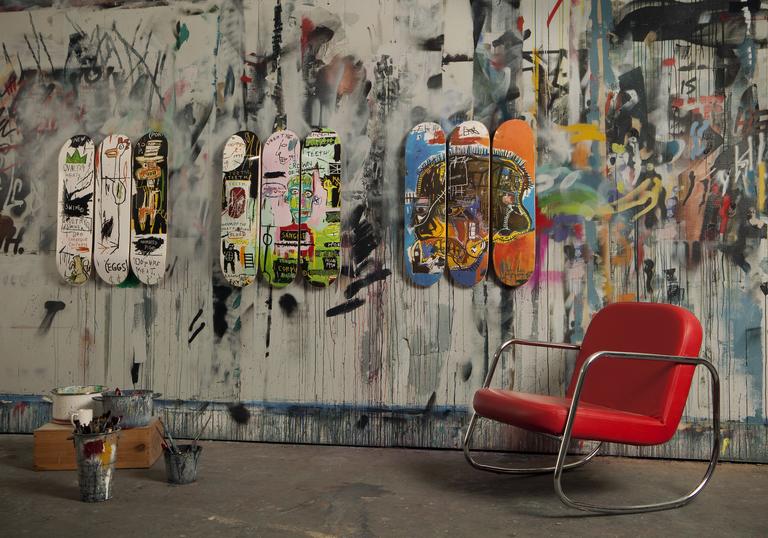 Photo of skateboards with Basquiat artwork