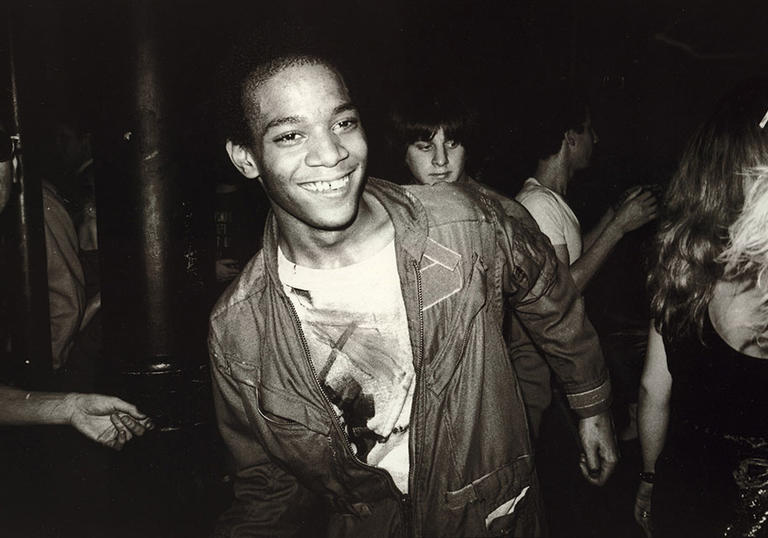 Photo of Jean Michel Basquiat dancing in the Mudd Club