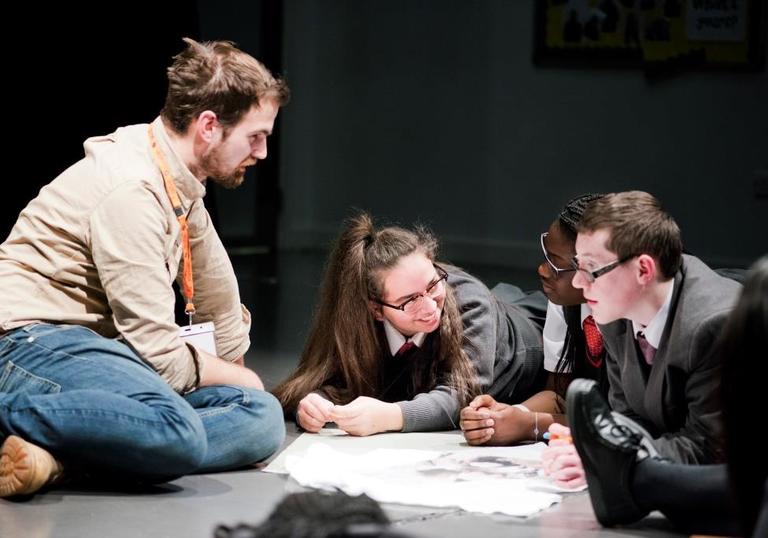 Photo of students working with a teacher on Barbican Box