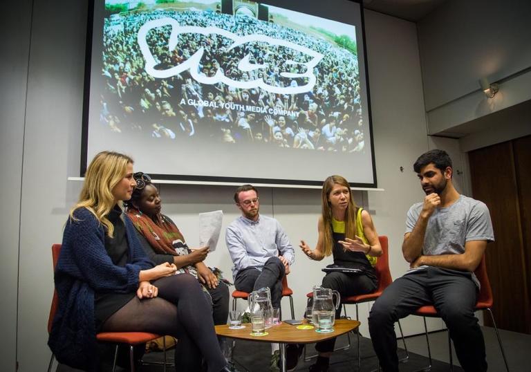 Photo of group of young people in a panel discussion