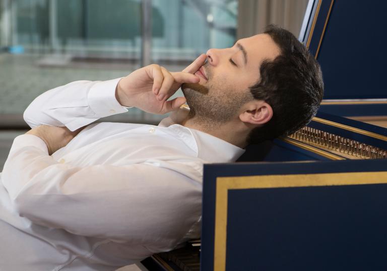 Mahan Esfahani head on desk