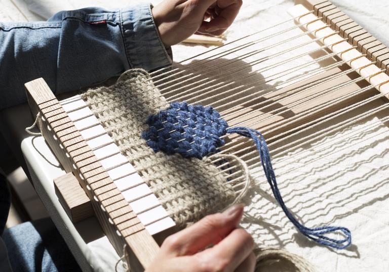 Detail of weaving workshop with Christabel Balfour featuring loom